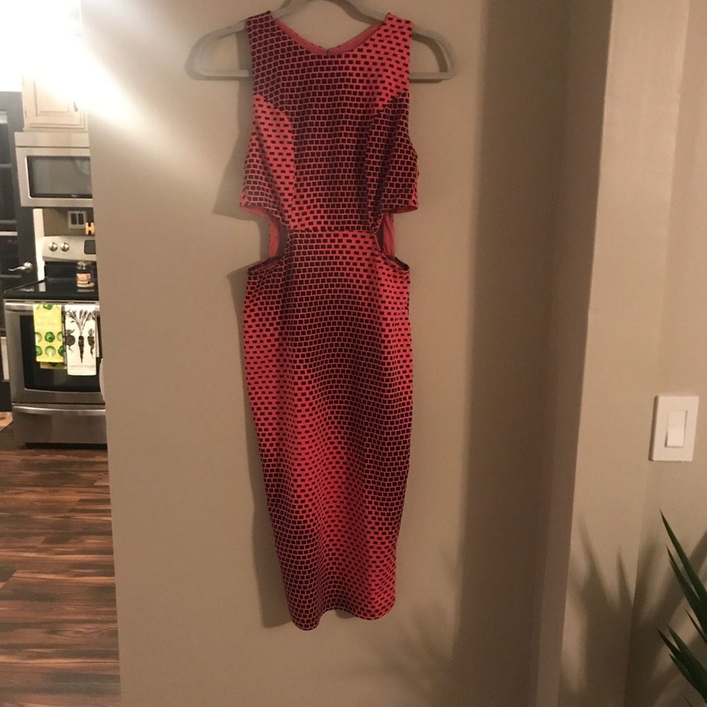 Knee length cut out pink dress